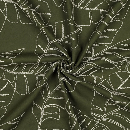 Image of linen with viscose-embroidered leaves on a green background, 210 g/m² – available at Šarlotes audumi