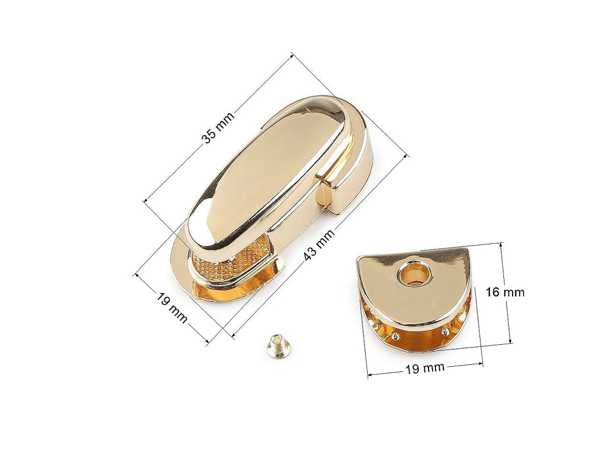 Pilt metallist koti kinnitist / lukust 19 × 43 mm – saadaval veebis Šarlotes audumi