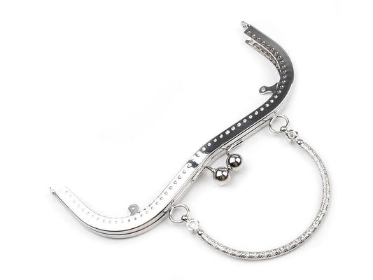 Attēls ar Metāla somiņas rāmis piešūšanai ar rokturi 5 × 8 cm| dažādu toņu – pieejams Šarlotes audumi