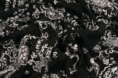 Image with lace fabric - black with silver 210 g/m² – available at Charlotte's Fabrics