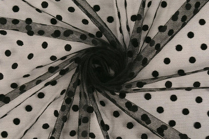 Image of soft tulle with velvet dots - black, available online at Charlotte's Fabrics