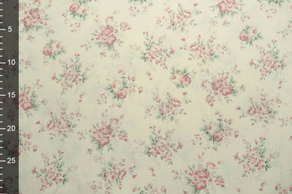 Mousseline - fleurs sur fond blanc lait 140 g/m²