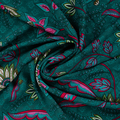 100% Viscose fabric, pattern on petrol background 90 g/m²