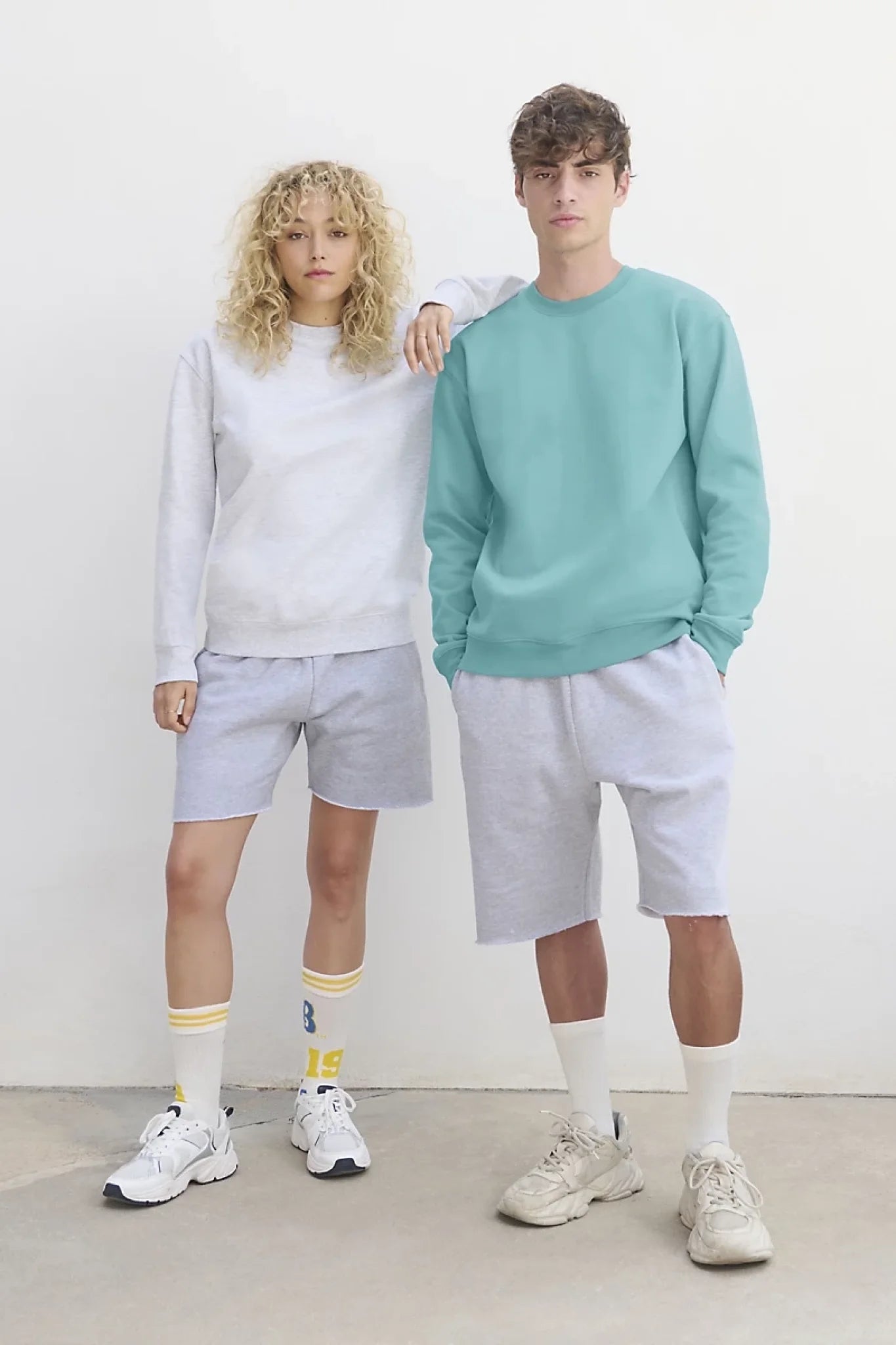 Image of a personalized black sweater with your logo – available online at Šarlotes audumi