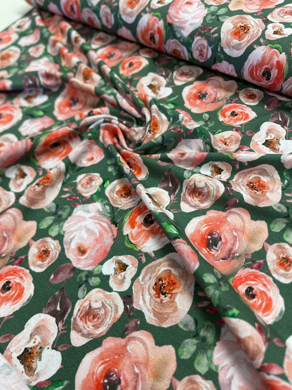 Jersey de coton fin - roses sur fond vert 200 g/m²