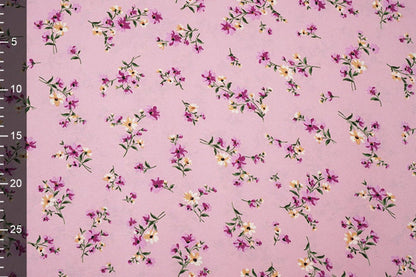 Image of thin crepe fabric with pink flowers – available online at Šarlotes audumi