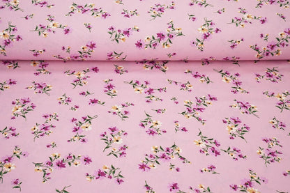 Thin crepe fabric with pink flowers – available online at Charlotte's Fabrics
