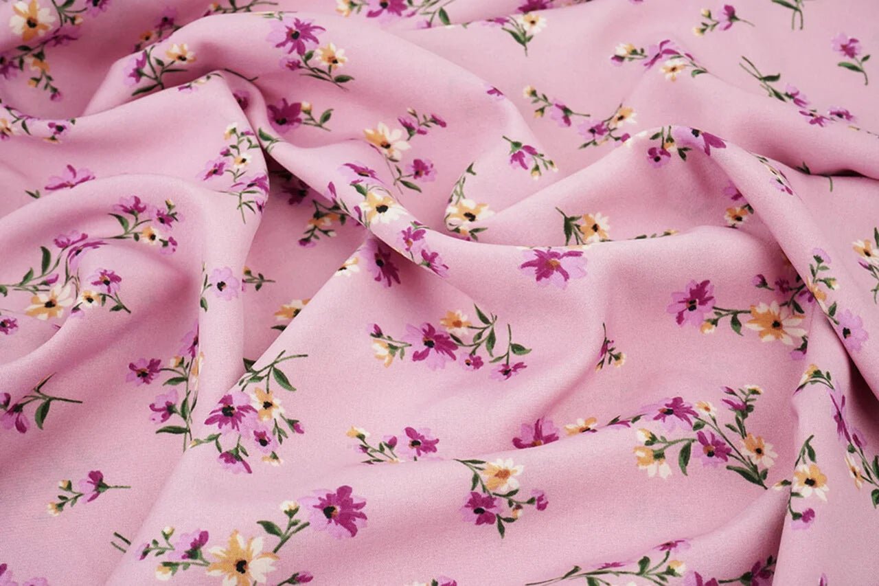 Image of thin pink floral crepe fabric – available online at Šarlotes audumi