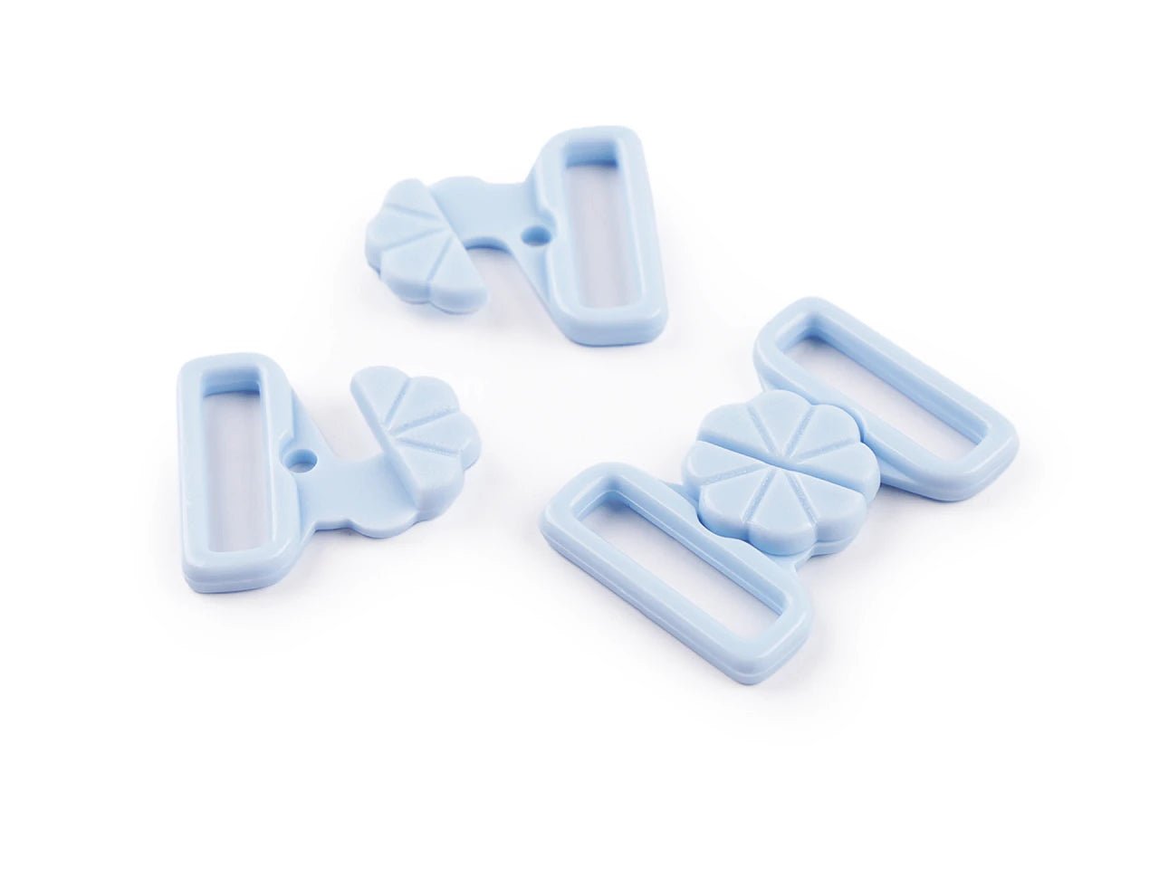 Image avec fermeture en plastique pour maillots de bain – 17 mm, 5 paires – disponible chez Šarlotes audumi