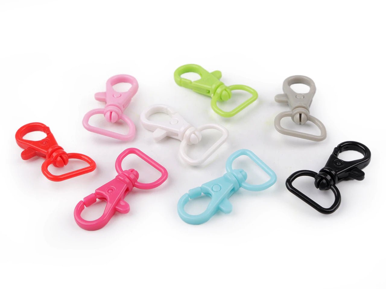 Attēls ar Plastmasas karabīnes ar grozāmu mehānismu – 17 mm 5.gab|dažādu toņu – pieejams Šarlotes audumi