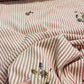 T-shirt fabric with elastane — striped with embroidered beads 135 g/m²