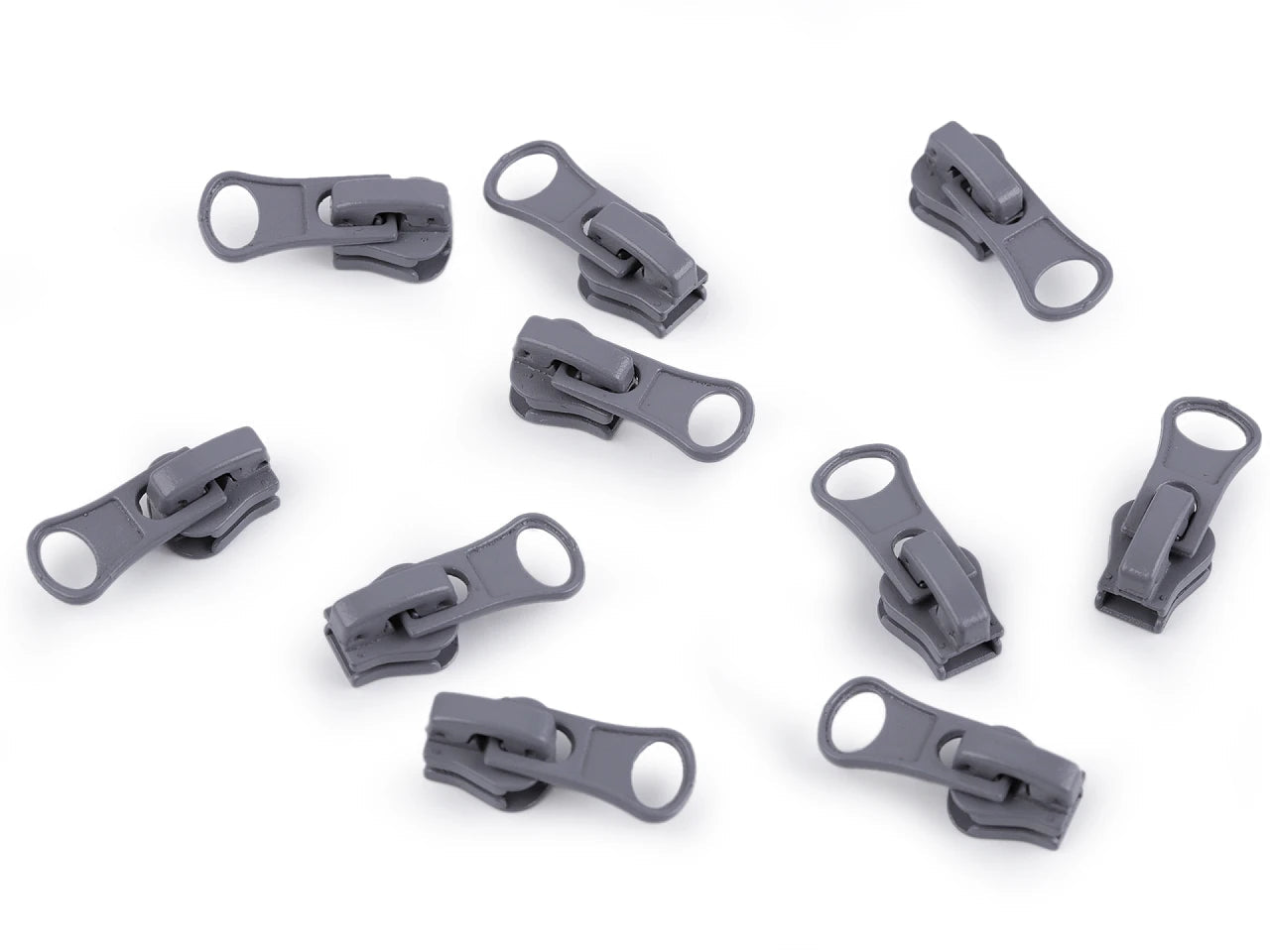 Attēls ar Slīdnis, kugītis plastmasas rāvējslēdzējam Nr.3|dažādu toņu – pieejams Šarlotes audumi