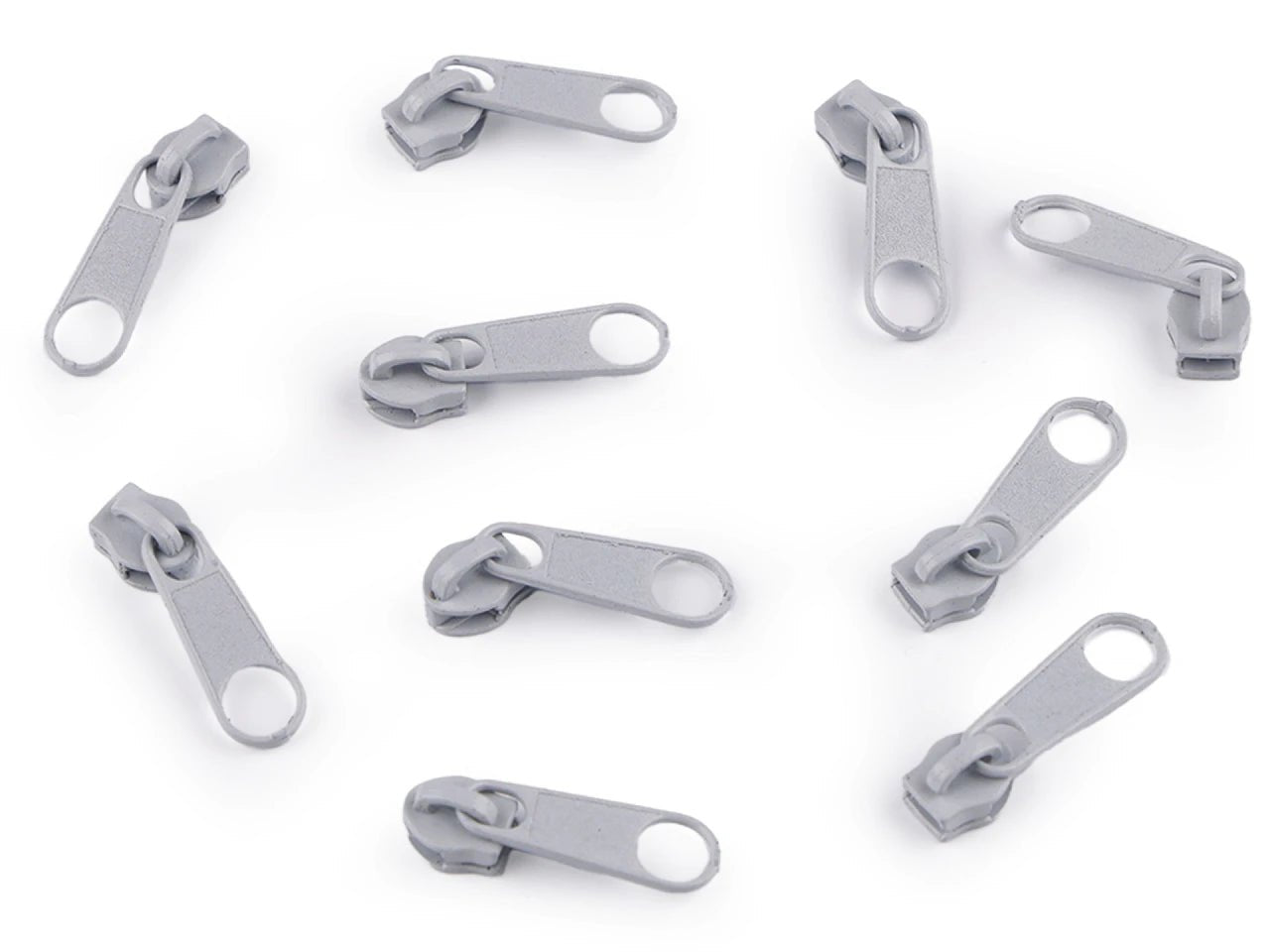 Attēls ar Slīdnis, kugītis spirālveida rāvējslēdzējam Nr.3|dažādu toņu – pieejams Šarlotes audumi