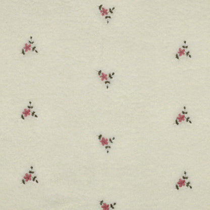 Teddy fleece in warm white with embroidery – available online at Šarlotes audumi