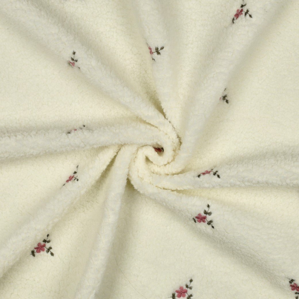 Teddy fleece, warm white, with embroidery – available online at Šarlotes audumi