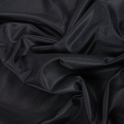 Image of black knitted lining fabric – available online at Šarlotes audumi