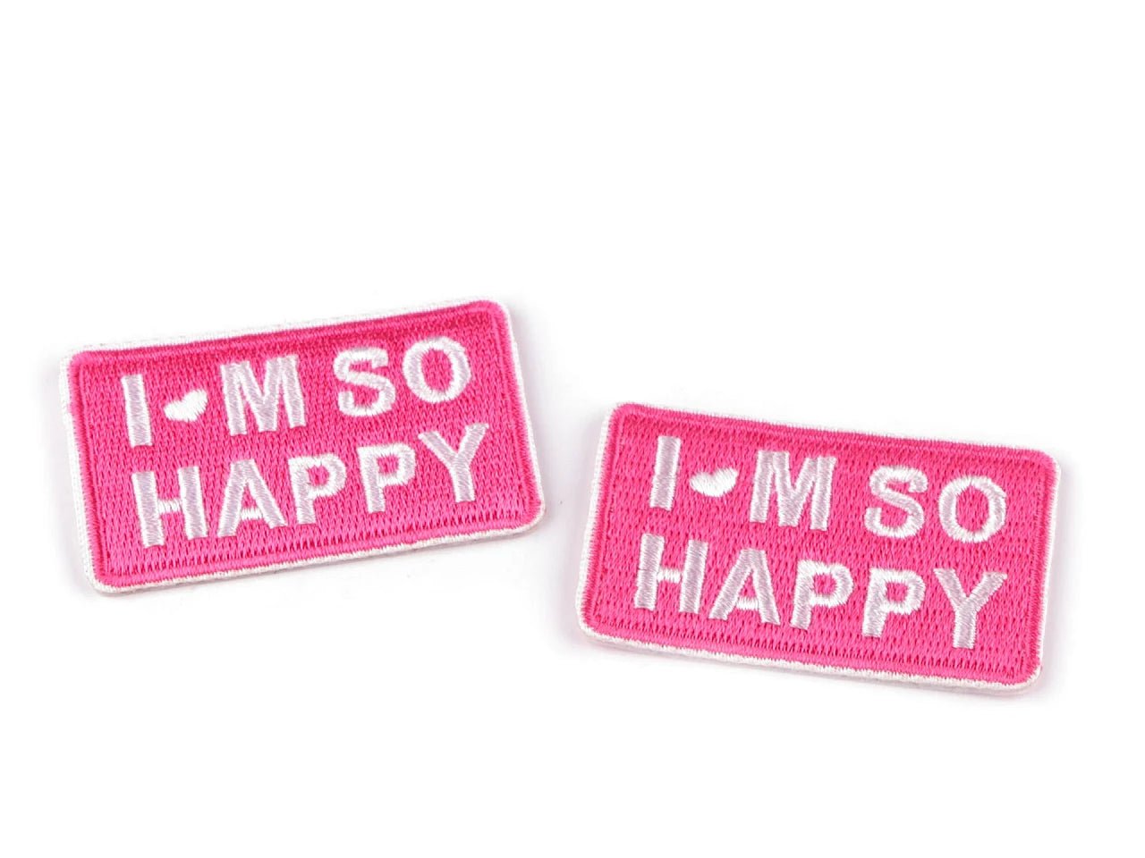 Image with iron-on patch “I’M SO HAPPY” – 3 × 5 cm – available online at Šarlotes audumi