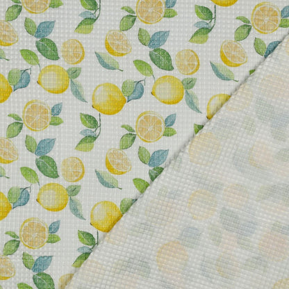 Image du tissu gaufré - citrons 185 g/m² – disponible chez Šarlotes audumi